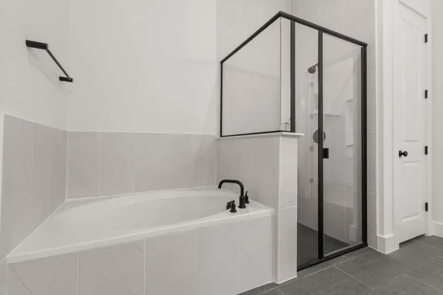 Walk-in shower in Primary Bath & Garden Tub - Representative Photo