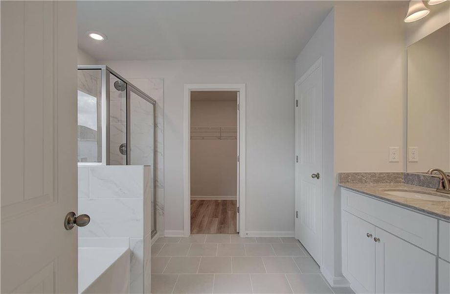 Furnished interior view inside a new home in Enclave at Evergreen, Fairburn (Image 13).