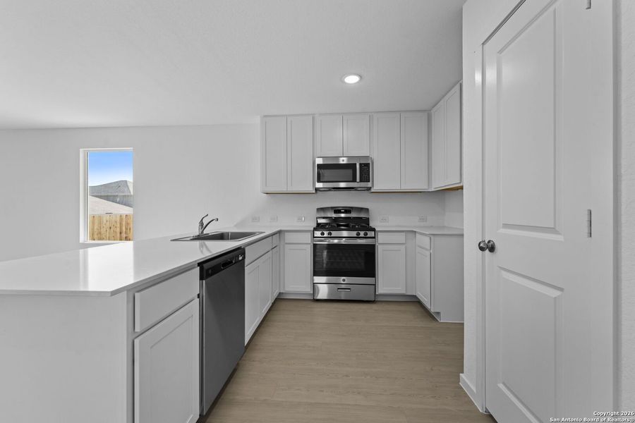 Furnished interior view inside a new home in , New Braunfels (Image 9).
