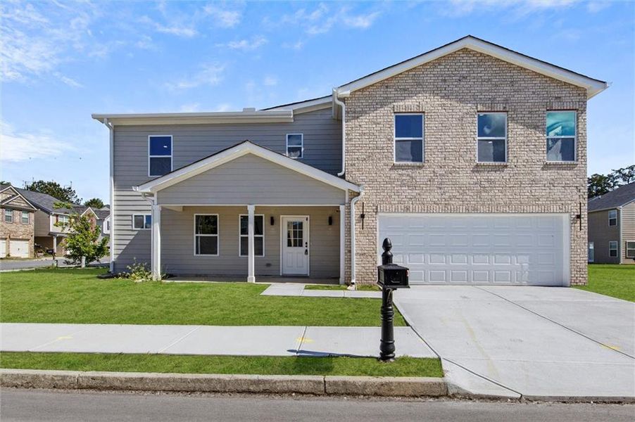 Front exterior of a new home in , Fairburn, GA, highlighting curb appeal (Image 22). Front exterior of a new home in , Fairburn, GA, highlighting curb appeal (Image 22).