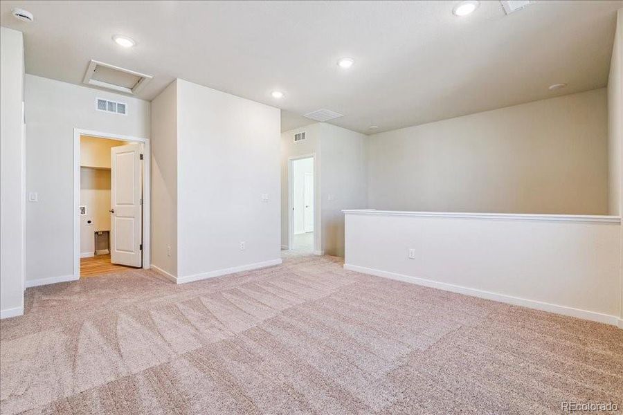 Spacious, unfurnished interior of a new home in Floret Collection at Alder Creek, Parker (Image 30).