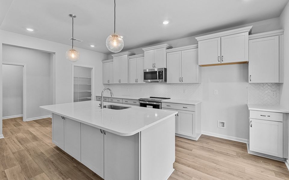 Furnished interior view inside a new home in Fieldstone, Lexington (Image 7).