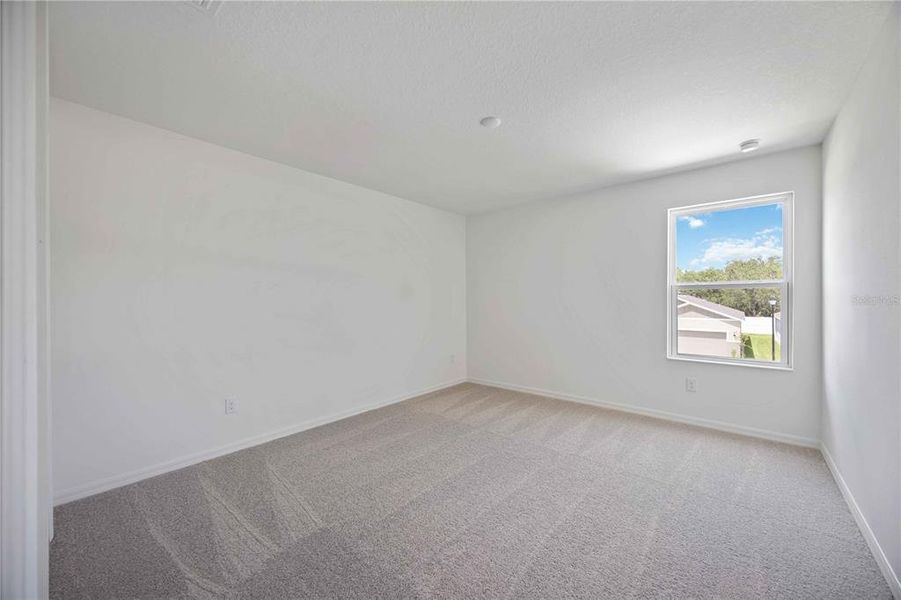 Spacious, unfurnished interior of a new home in Creekside at Rutland Ranch, Parrish (Image 15).