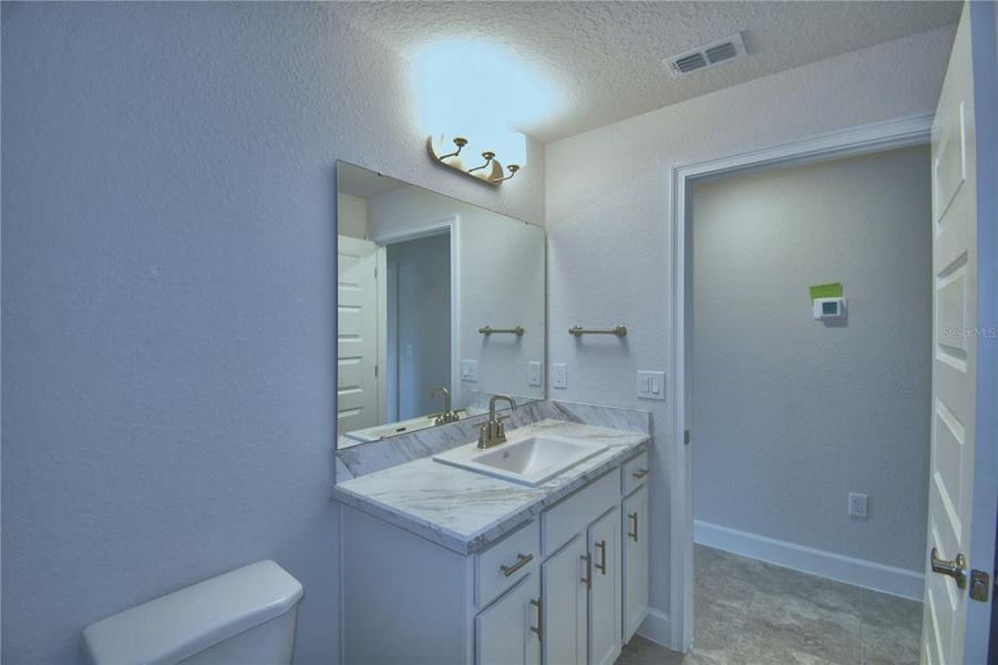 Furnished interior view inside a new home in Cadence Crossing, Auburndale (Image 5).