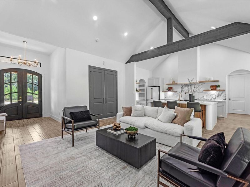 Enjoy the tall ceilings, exposed beams and the contrast of all the colors meshing beautifully