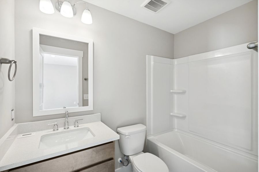 Furnished interior view inside a new home in Point Hope - Cottage Collection, Charleston (Image 15). Furnished interior view inside a new home in Point Hope - Cottage Collection, Charleston (Image 15).