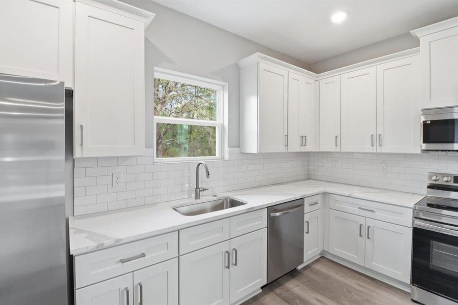 Furnished interior view inside a new home in , Ocala (Image 9).