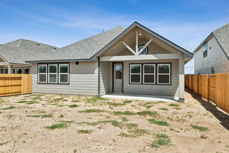 Backyard with covered patio Backyard with covered patio