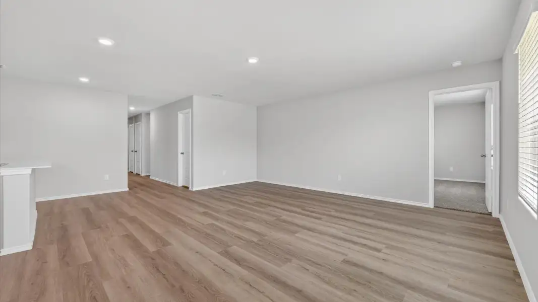 Spacious, unfurnished interior of a new home in Monarch at the Meadows, Ponder (Image 12).