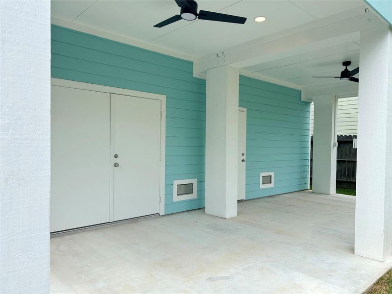 Double door access to patio and yard from garage