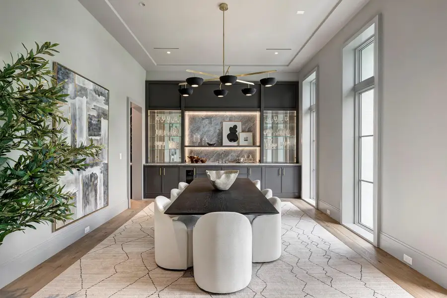 Stylish and functional, this room can be a formal dining room for large dinner parties or a bar/lounge.