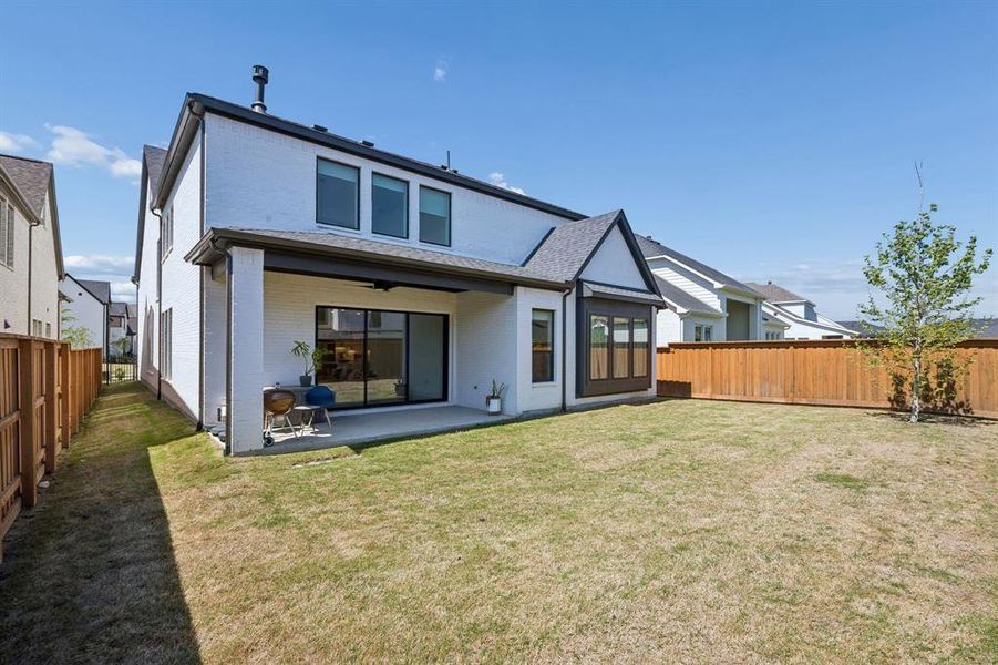 Exterior details and patio area of a home in Fields 50', Frisco (Image 4). Exterior details and patio area of a home in Fields 50', Frisco (Image 4).