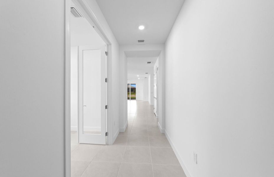 Spacious, unfurnished interior of a new home in TerraWalk at Babcock Ranch, Alva (Image 14). Spacious, unfurnished interior of a new home in TerraWalk at Babcock Ranch, Alva (Image 14).