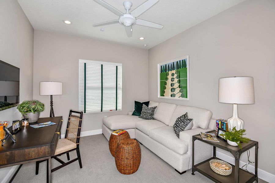 Representative furnished interior of a home built from the Triumph by Neal Communities in Verandah, Fort Myers (Image 8).