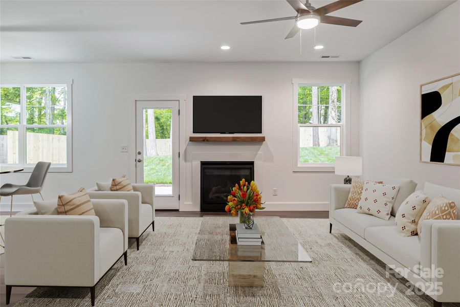 Main level living area - virtually staged Main level living area - virtually staged