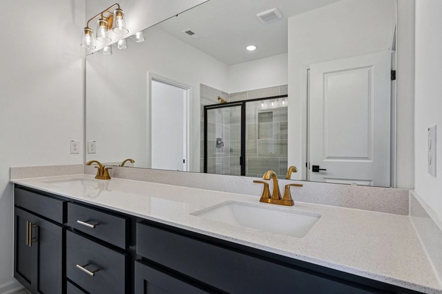 Primary Bath featuring the AW Collection® Sapphire - Clean white and cool hues define the space. Primary Bath featuring the AW Collection® Sapphire - Clean white and cool hues define the space.