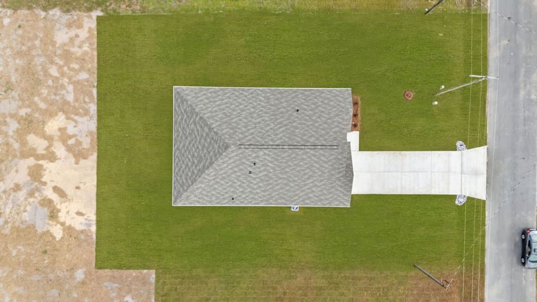 Exterior details and patio area of a home in Wilson's Ridge, Wilson's Mills (Image 25).