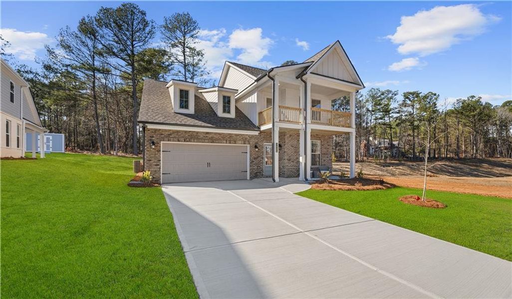 Front exterior of a new home in Hamilton Lakes, Lawrenceville, GA, highlighting curb appeal (Image 24). Front exterior of a new home in Hamilton Lakes, Lawrenceville, GA, highlighting curb appeal (Image 24).