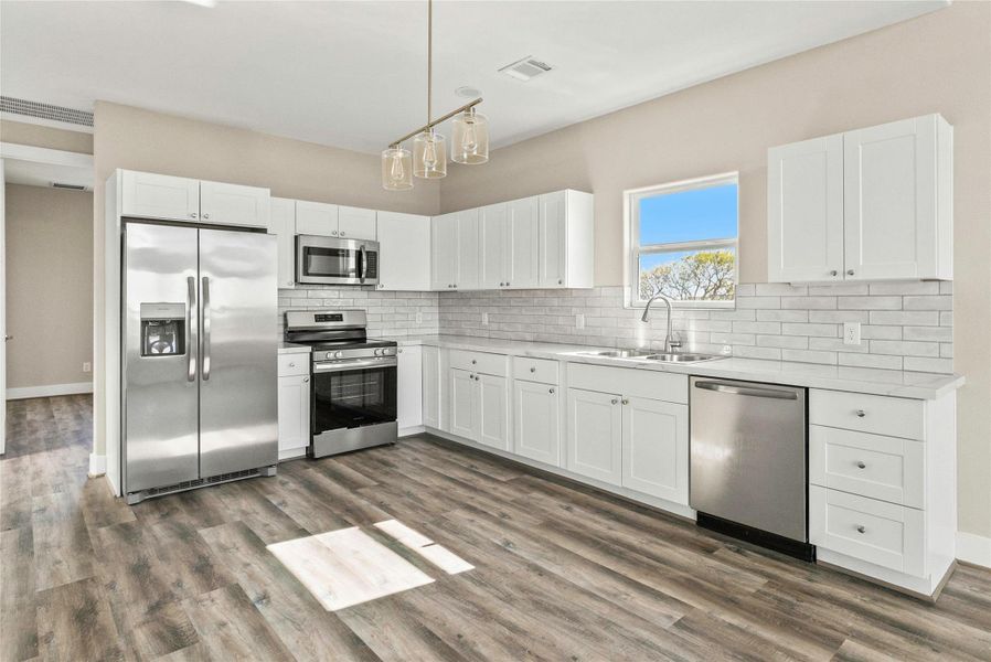 Furnished interior view inside a new home in , Matagorda (Image 6).