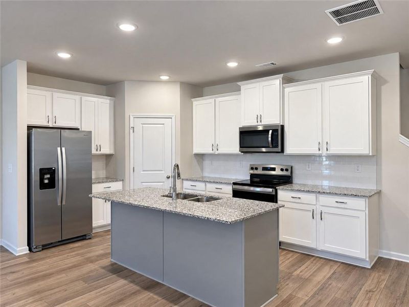 Furnished interior view inside a new home in Lake Carlton, Loganville (Image 5).