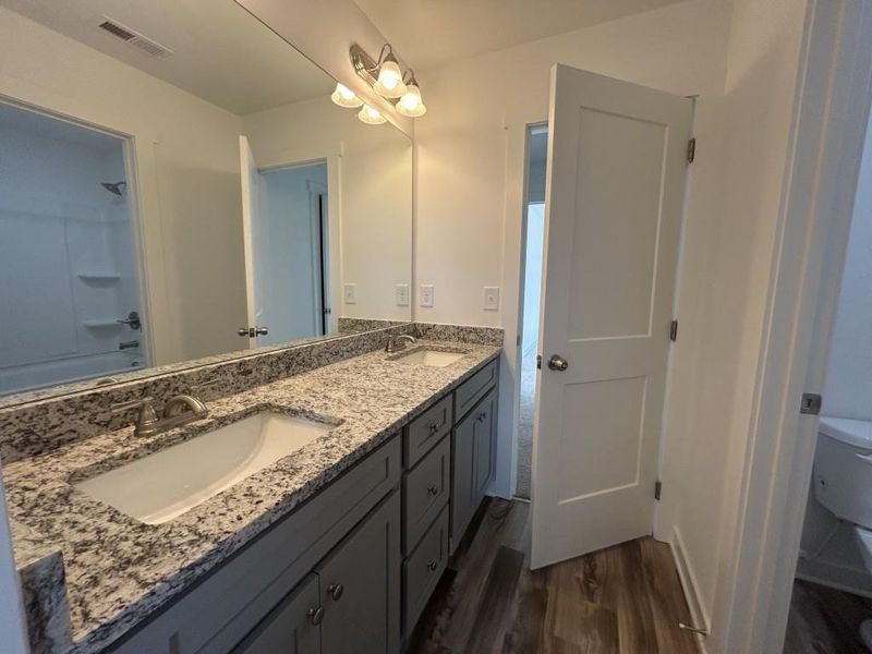 Furnished interior view inside a new home in Sutton's Landing, Statham (Image 7).