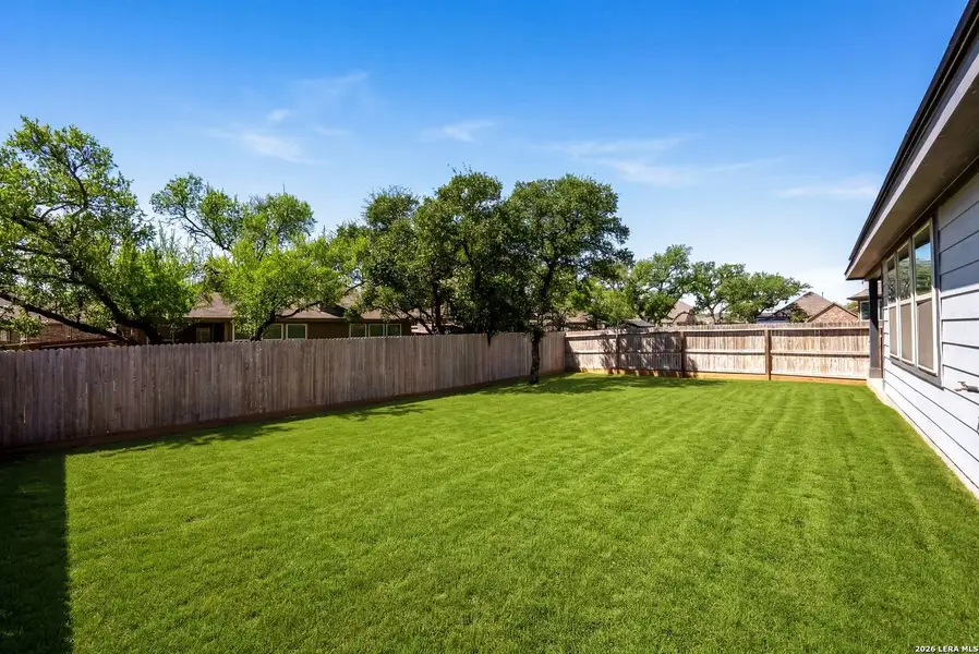 Exterior details and patio area of a home in Davis Ranch, San Antonio (Image 3).