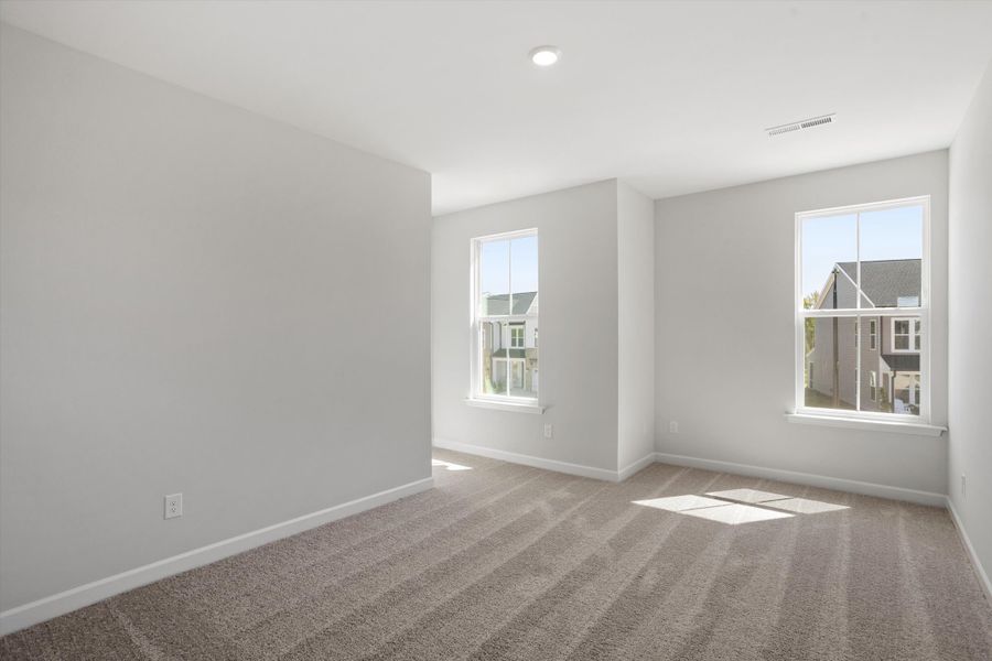 Spacious, unfurnished interior of a new home in Ovation at Sweetbrier, Durham (Image 23).