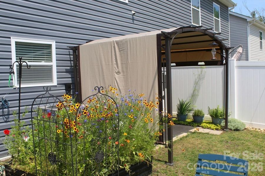 Exterior details and patio area of a home in , Candler (Image 20). Exterior details and patio area of a home in , Candler (Image 20).