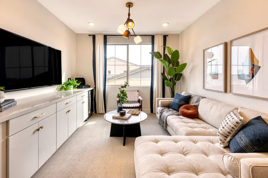 Representative furnished interior of a home built from the Tipton Plan 3507 by Tri Pointe Homes in Waterston Central, Gilbert (Image 13).
