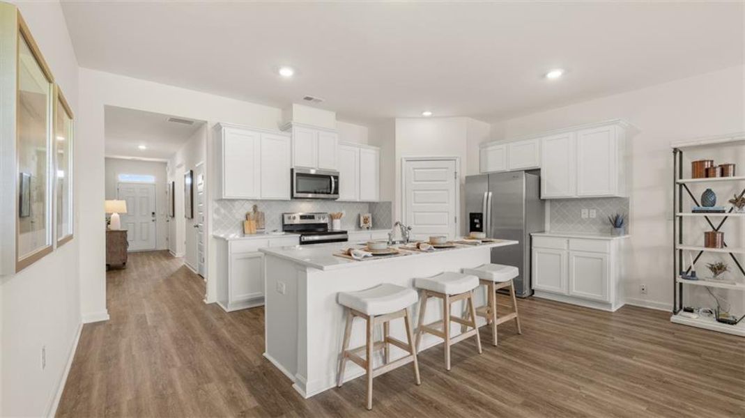 Furnished interior view inside a new home in The Preserve at Agricultural Village, Perry (Image 11). Furnished interior view inside a new home in The Preserve at Agricultural Village, Perry (Image 11).