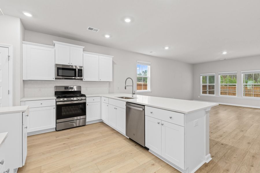 Furnished interior view inside a new home in Sweetgrass at Summers Corner, Summerville (Image 8).