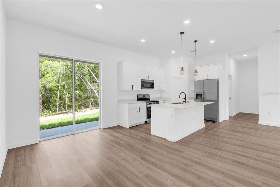 Furnished interior view inside a new home in , Dunnellon (Image 7).