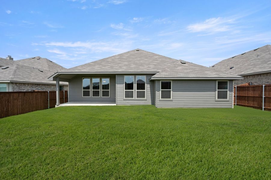 Front exterior of a new home in Still Water Lake Estates, Godley, TX, highlighting curb appeal (Image 27).