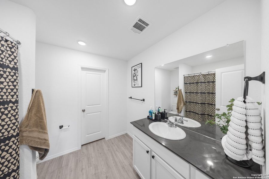 Furnished interior view inside a new home in Guadalupe Heights: Watermill Collection, Seguin (Image 15). Furnished interior view inside a new home in Guadalupe Heights: Watermill Collection, Seguin (Image 15).