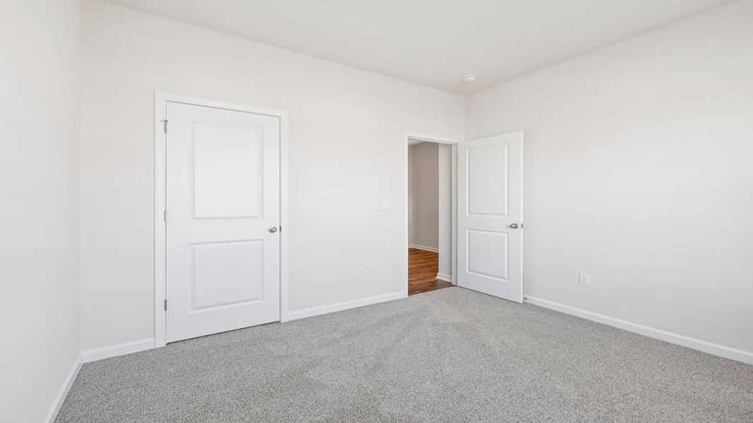 Spacious, unfurnished interior of a new home in Bentley Park, Greenwood (Image 25). Spacious, unfurnished interior of a new home in Bentley Park, Greenwood (Image 25).