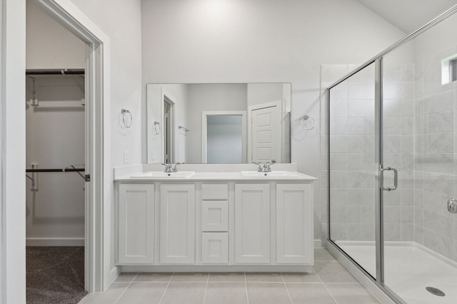 Primary Bathroom in the Amber home plan by Trophy Signature Homes – REPRESENTATIVE PHOTO