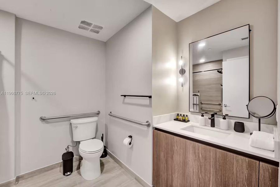 Furnished interior view inside a new home in , Miami Beach (Image 6). Furnished interior view inside a new home in , Miami Beach (Image 6).