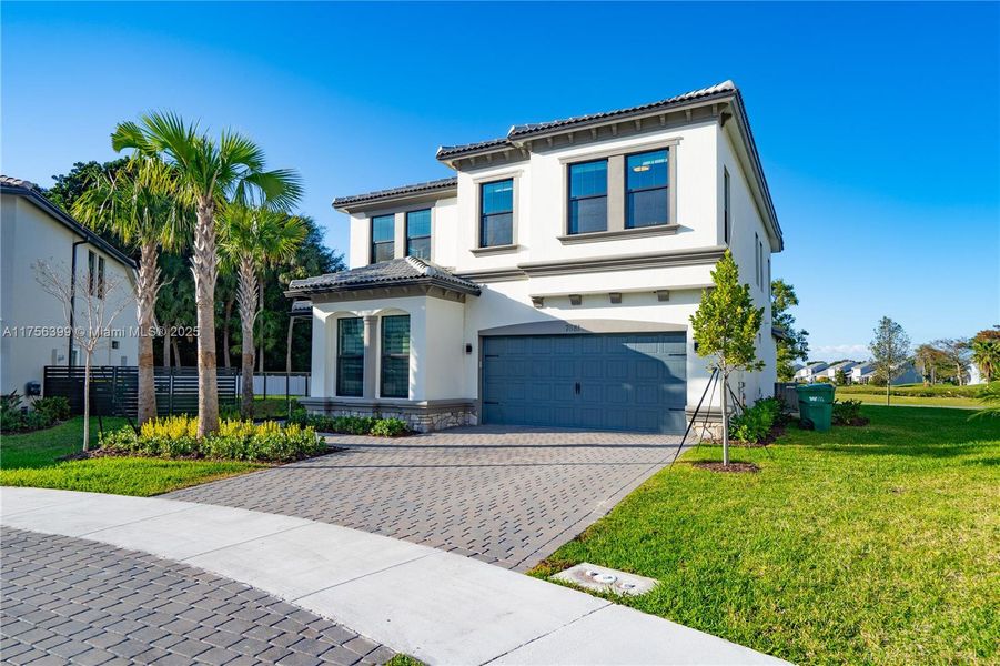 Front exterior of a new home in , Tamarac, FL, highlighting curb appeal (Image 20).
