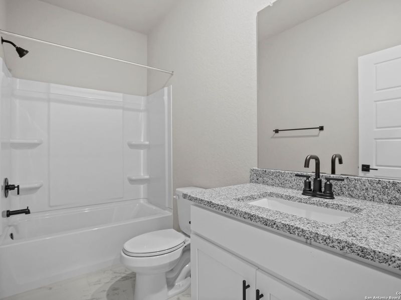 Furnished interior view inside a new home in Hannah Heights, Seguin (Image 12).