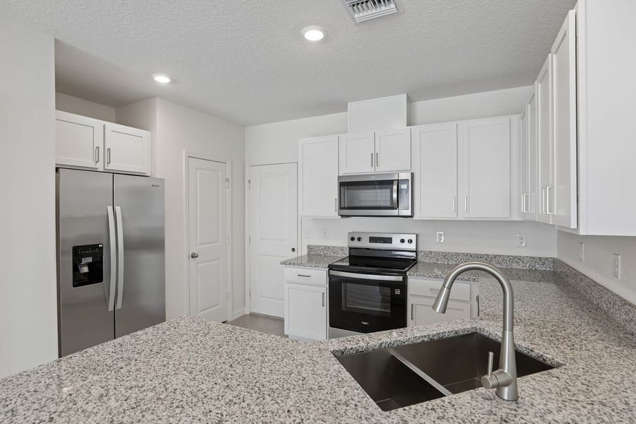 Furnished interior view inside a new home in Reserve at Forest Lake Townhomes, Lake Wales (Image 6). Furnished interior view inside a new home in Reserve at Forest Lake Townhomes, Lake Wales (Image 6).