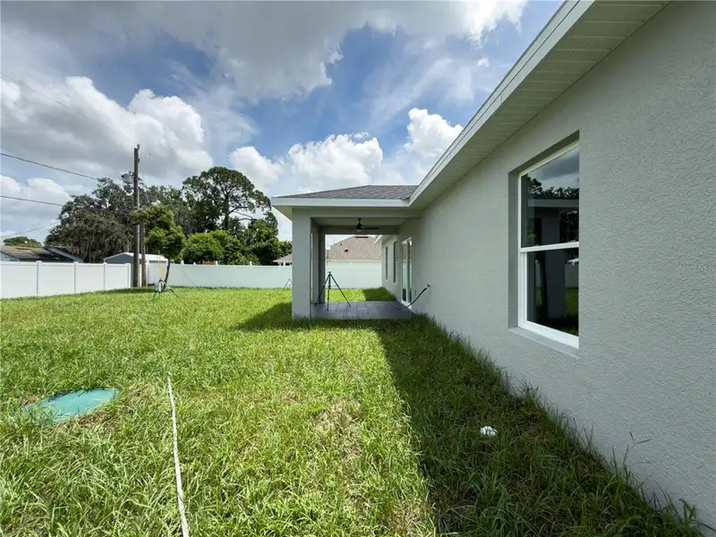 Exterior details and patio area of a home in , Deltona (Image 17).