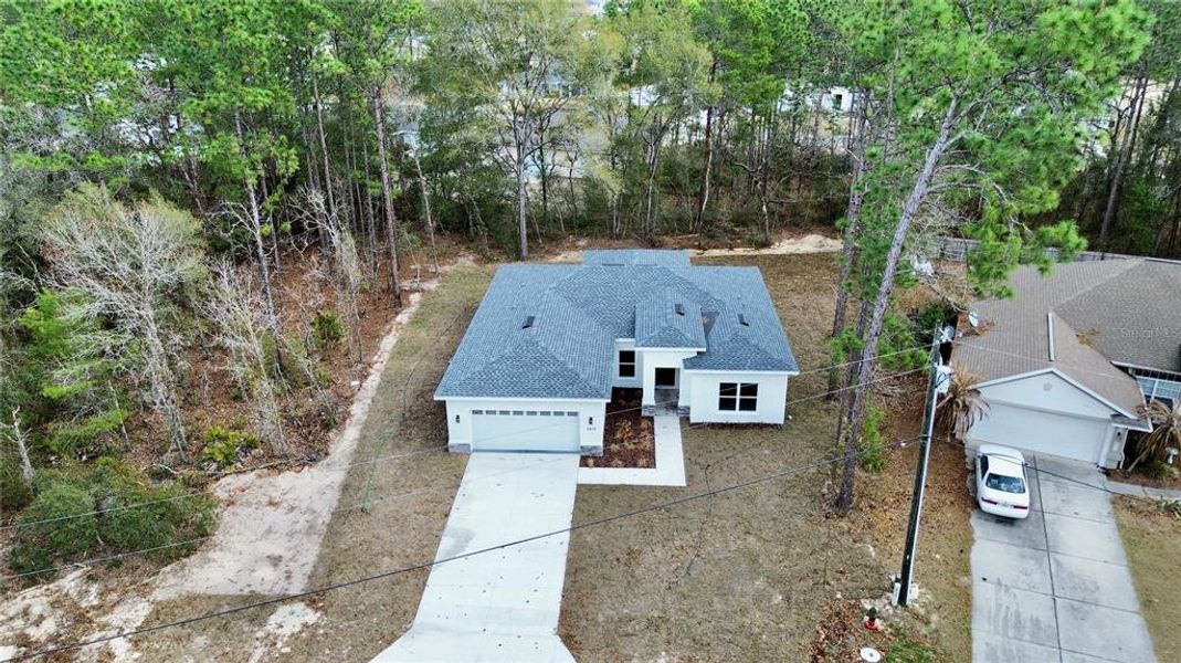 Front exterior of a new home in , Ocala, FL, highlighting curb appeal (Image 23).