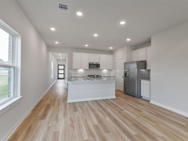Furnished interior view inside a new home in Windmill Estates, Magnolia (Image 7).