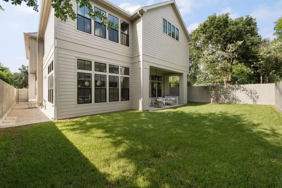 Exterior details and patio area of a home in , Houston (Image 3).
