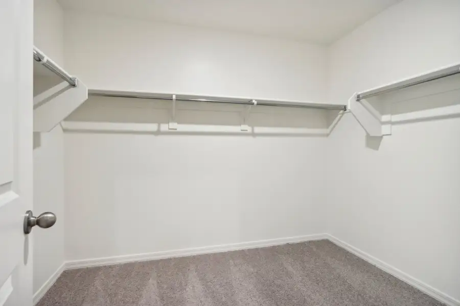 Representative unfurnished interior of a home built from the Eclipse by Starlight Homes in Stonebridge Manor, Waddell (Image 24).