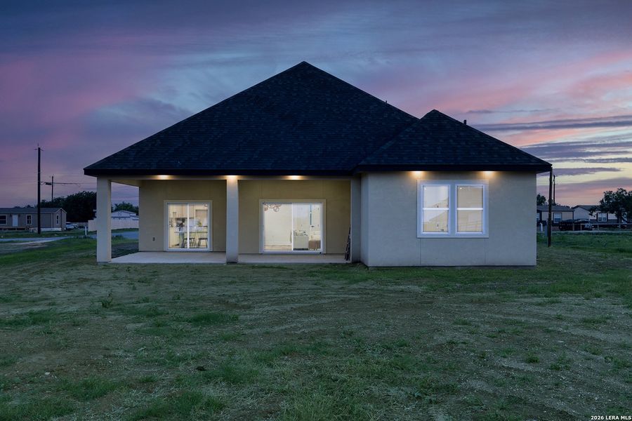 Exterior details and patio area of a home in , Atascosa (Image 4).