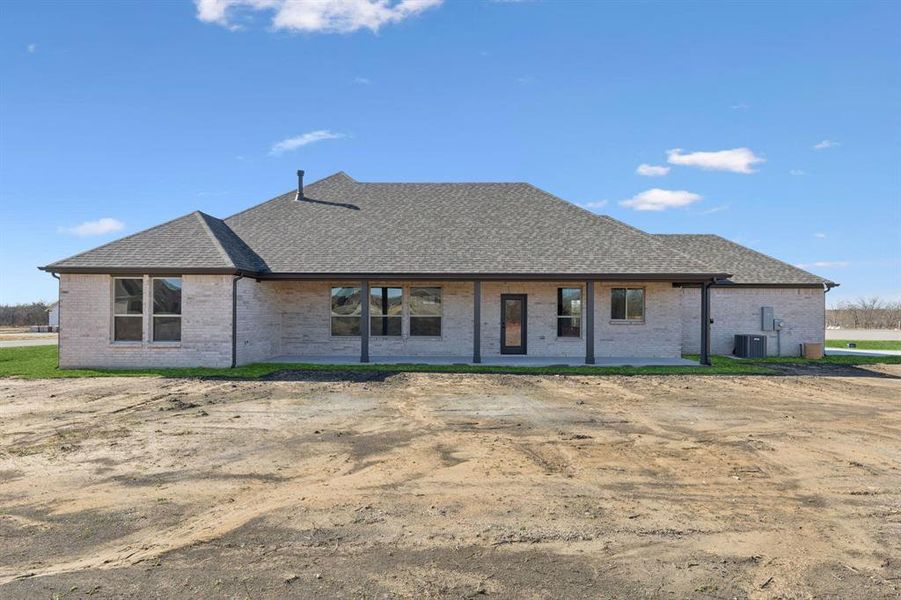 Exterior details and patio area of a home in Ellis Ranch Estates, Waxahachie (Image 4).