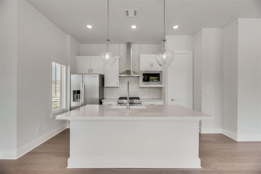 Furnished interior view inside a new home in Collin Creek, Plano (Image 7).