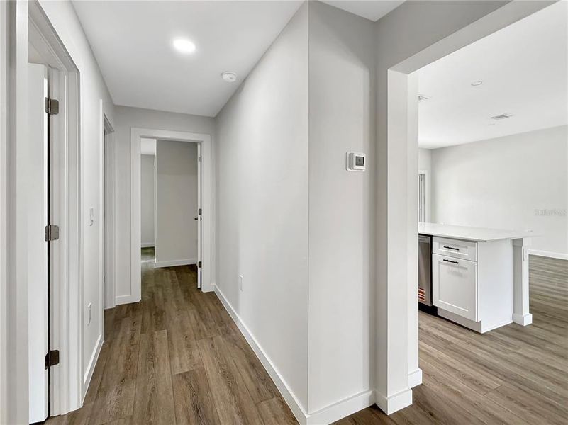 Hallway from Garage and Laundry Room leading to 2nd and 3rd Bedrooms and Guest Bathroom