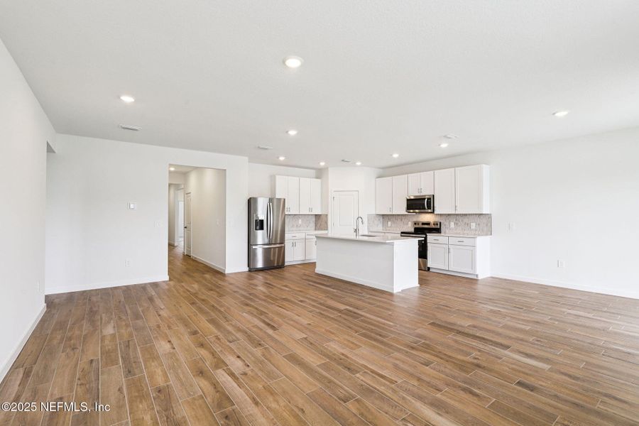 Spacious, unfurnished interior of a new home in Lakes at Bella Lago - Signature Series, Green Cove Springs (Image 22).